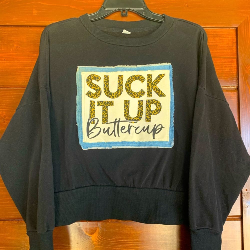 Women’s size small up-cycled crop sweatshirt.